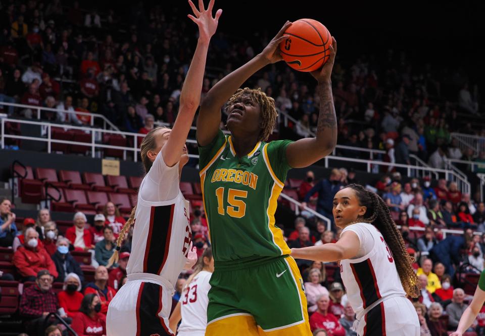 Jan 29, 2023; Stanford, California, USA; Oregon Ducks center Phillipina Kyei (15) shoots the ball against Stanford Cardinal forward Cameron Brink (22) during the first quarter at Maples Pavilion. Mandatory Credit: Kelley L Cox-USA TODAY Sports