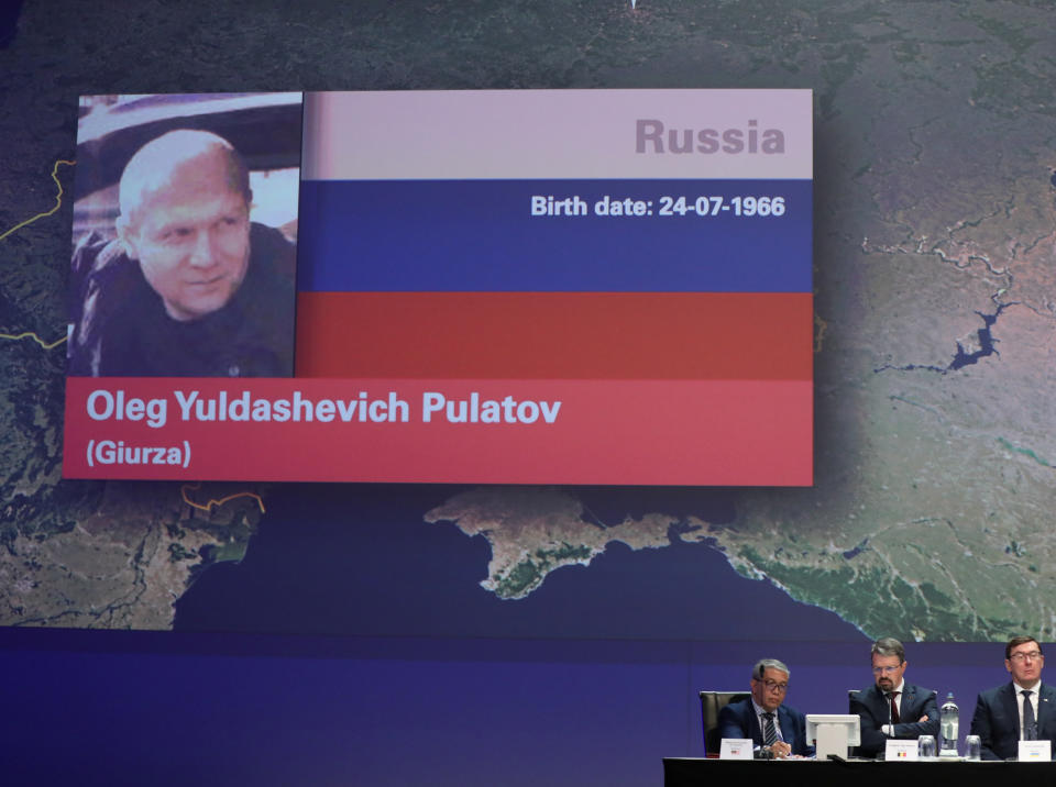 A picture of Russian national Oleg Pulatov is shown on screen as international investigators present their latest findings in the downing of Malaysia Airlines flight MH17, nearly five years after the crash that killed 298 passengers and crew, in Nieuwegein, Netherlands, June 19, 2019.  REUTERS/Eva Plevier