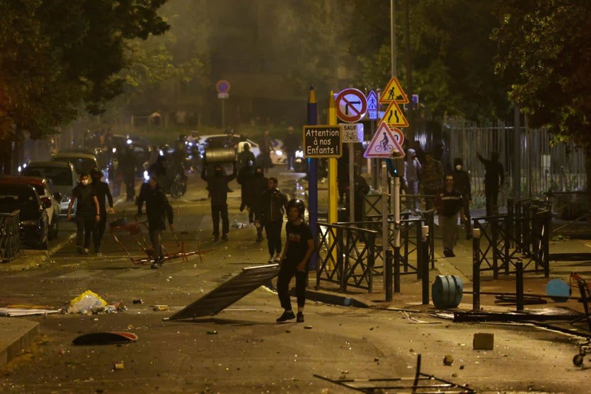 Protesters riot in Nanterre, west of Paris, on June 28, 2023, a day after the killing of 17-year-old boy (AFP via Getty Images)