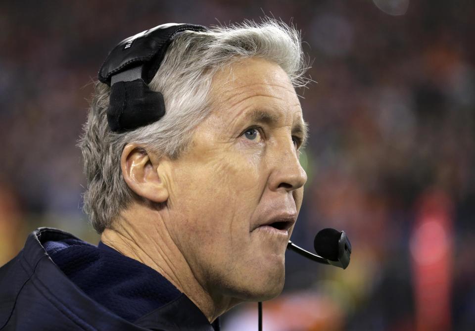 Seattle Seahawks head coach Pete Carrol watches from the sidelines during first quarter against the Denver Broncos in the NFL Super Bowl XLVIII football game in East Rutherford