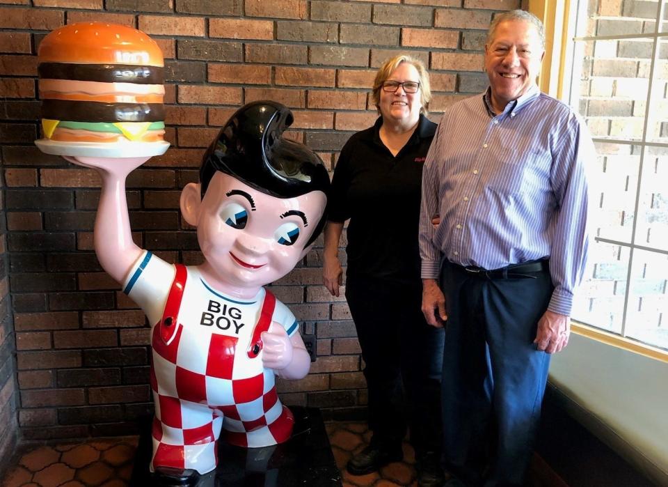 Big Boy owners Jean and Nick Shaieb pose with their restaurant's mascot Friday, May 26, 2023.