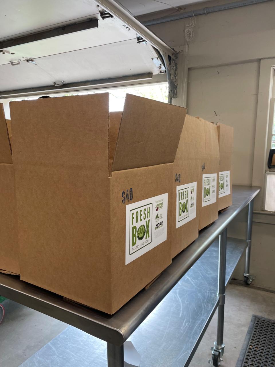 Growing Places packs and distributes approximately 500 packages of produce every week, including deliveries to the Gardner and Winchendon CAC.