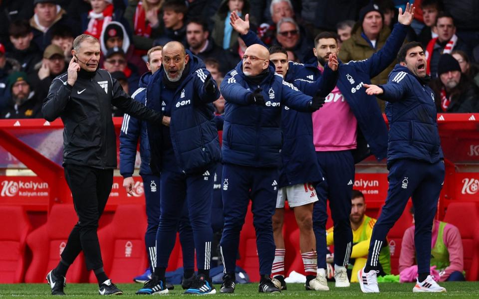 Nottingham Forest manager Nuno Espirito Santo remonstrates to the fourth official