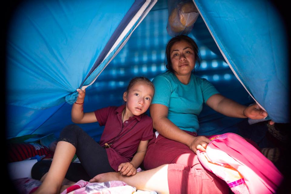 Asylum-seeking families with their children have stayed in tents while waiting for their names to be called at the border in San Luis Rio Colorado, Mexico.