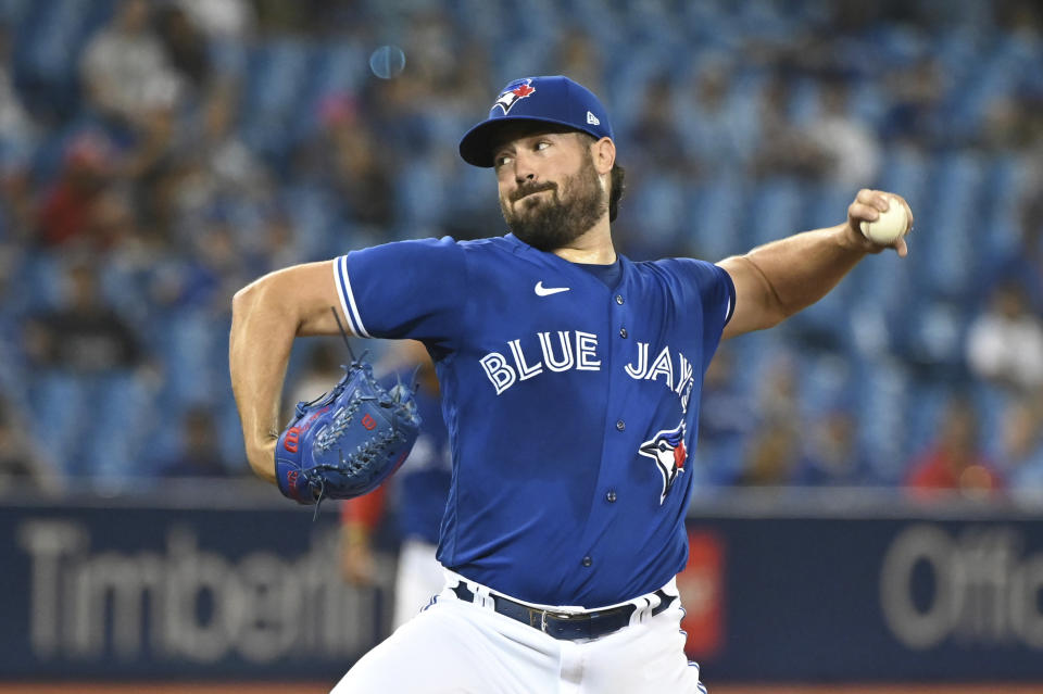 Toronto Blue Jays starting pitcher Robbie Ray delivers in the first inning of the first baseball game of a doubleheader against the Boston Red Sox in Toronto, Saturday Aug. 7, 2021. (Jon Blacker/The Canadian Press via AP)