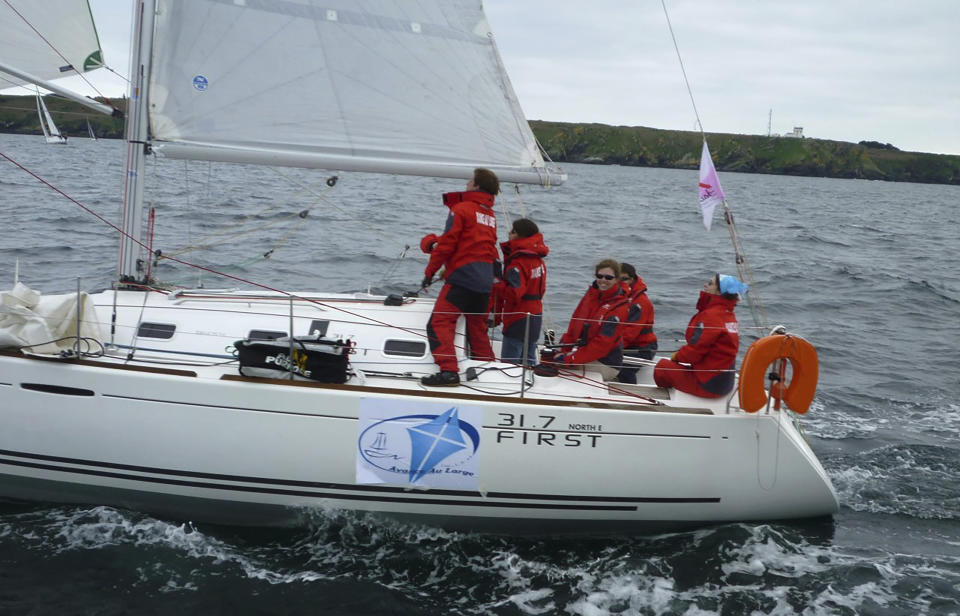 Sister Nathalie Becquart sails during a regatta in Brest, France on April 2010. Becquart, the first female undersecretary in the Vatican's Synod of Bishops, is charting the global church through an unprecedented, and even stormy, period of reform as one of the highest-ranking women at the Vatican. (Bishop Conference of France via AP)