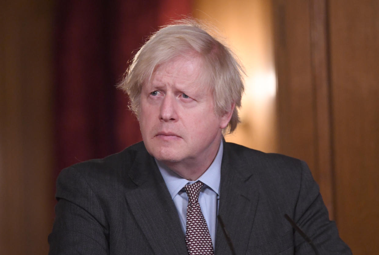 LONDON, ENGLAND - FEBRUARY 03:  Prime Minister Boris Johnson takes part in a media briefing in Downing Street on February 3, 2021 in London, England. The UK has now administered in excess of 10 million vaccinations. Daily new cases of Covid-19 were 19,202, down week on week by 25.1%  and 1,322 further deaths, down from 1,449 yesterday. (Photo by Stefan Rousseau-WPA Pool/Getty Images)