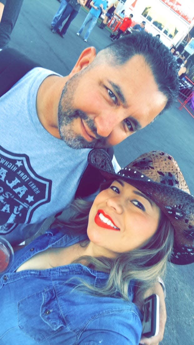 Robert Aguilar and his then girlfriend, Rosa Miranda, take a selfie at the Route 91 Harvest Festival in Las Vegas on Oct. 1, 2017, just hours before a gunman would open fire on the crowd, killing 58 people and wounding more than 400 others, including Aguilar.