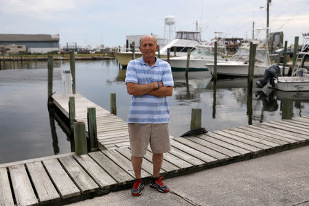 Mikey Daniels poses in Wanchese North Carolina, U.S., May 31, 2017. Picture taken May 31, 2017. REUTERS/Shannon Stapleton