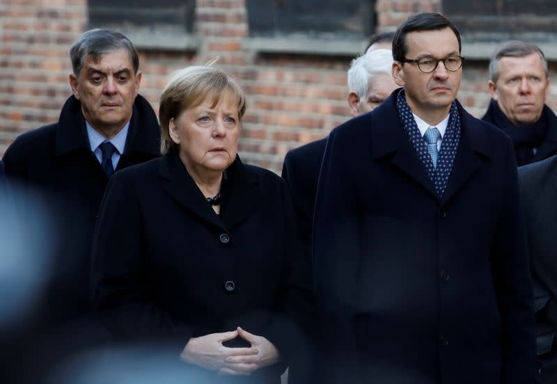 German Chancellor Angela Merkel and Polish Prime Minister Mateusz Morawiecki visit the Auschwitz-Birkenau memorial and museum