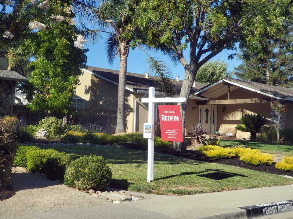 Sign for technology driven realtor Redfin on home for sale in San Ramon, California, September 17, 2019. (Photo by Smith Collection/Gado/Getty Images)