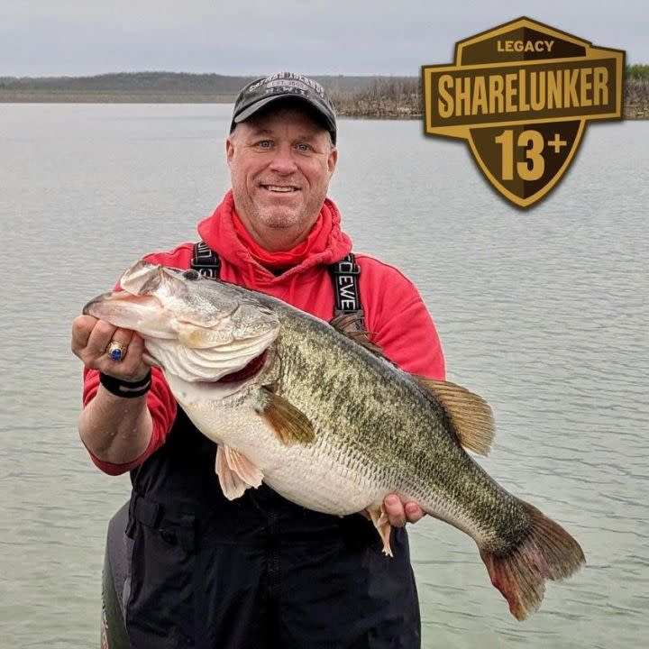 William Robey with his Legacy Class ShareLunker caught in O.H. Ivie. 