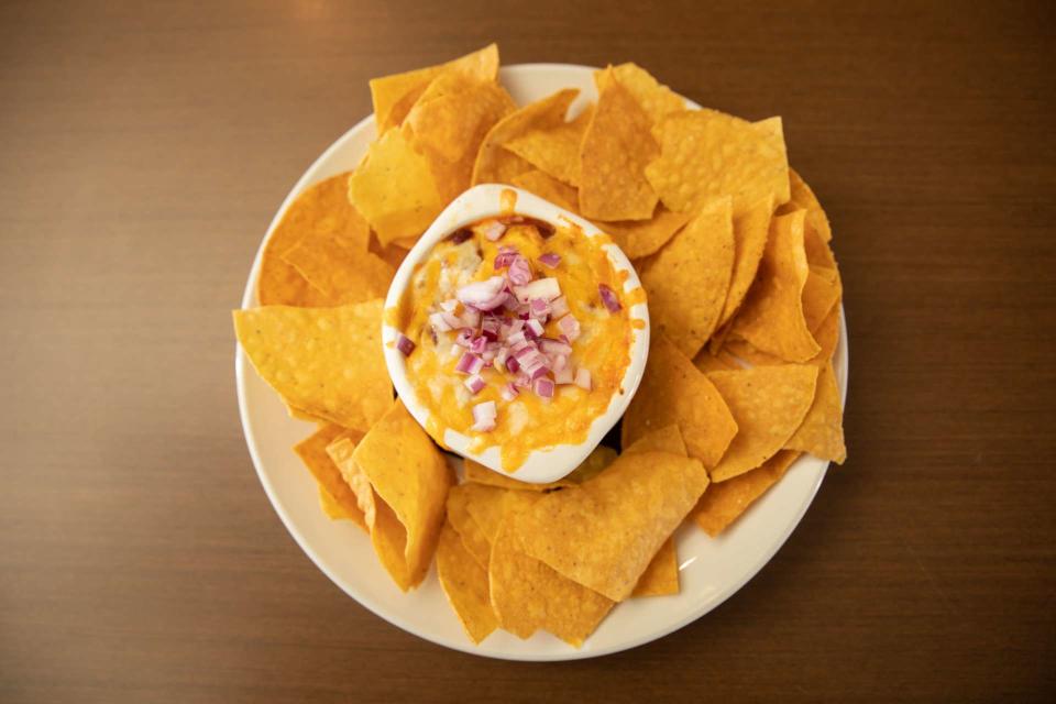 Warm up with a cup of chili with monterey jack cheese, red onions and tortilla chips at Barrett's Alehouse in Fall River.