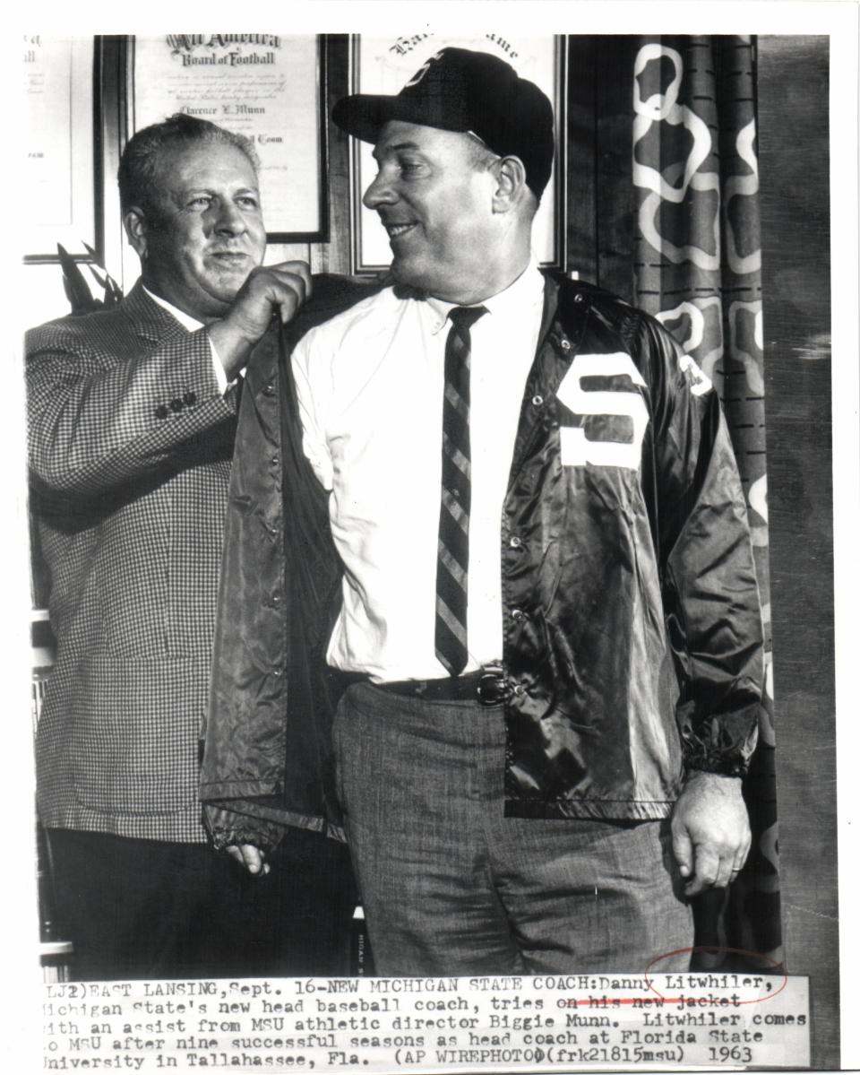 Michigan State athletic director Biggie Munn welecomes new baseball coach Danny Litwhiler on Sept. 16, 1963.