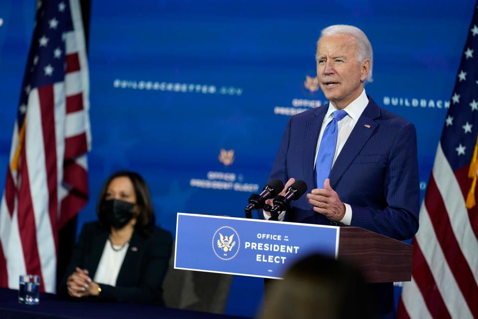 President-elect Joe Biden speaks as Vice President-elect Kamala Harris listens at left, during an event to introduce their nominees and appointees to economic policy posts at The Queen theater, Tuesday, Dec. 1, 2020, in Wilmington, Delaware.