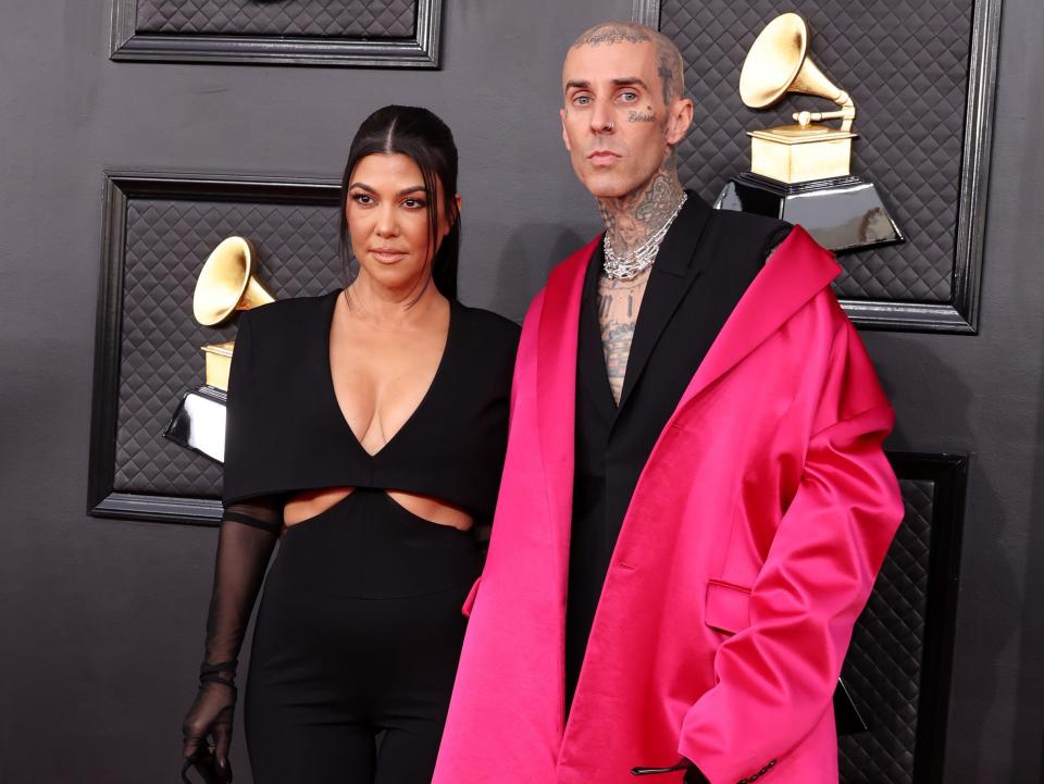 Travis Barker and Kourtney Kardashian at 2022 Grammy Awards