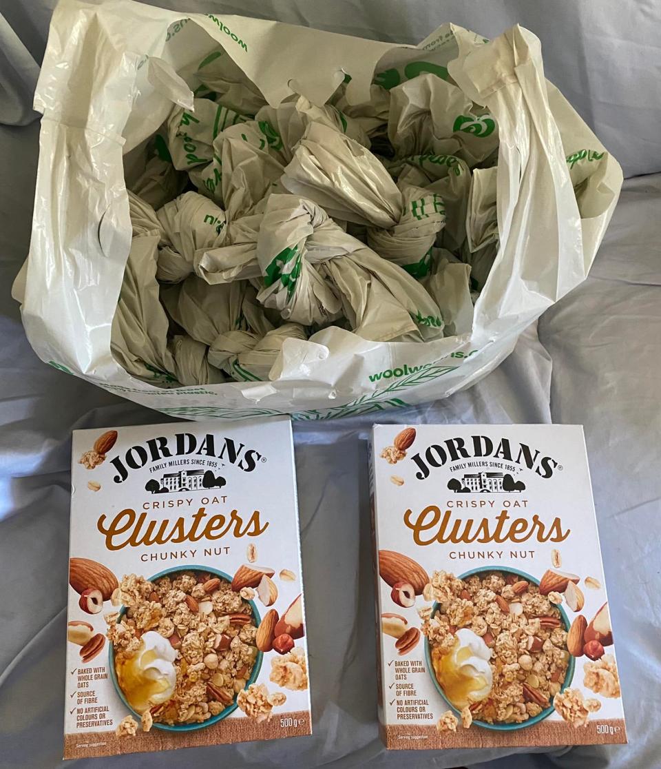 Photo of multiple Woolworths plastic shopping bags alongside two small boxes of oats. Source: Facebook