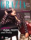 <p>For the Grazia cover, Sonakshi chose a red-brown Buberry outfit, showing off her curves. Deep brown lips completed her look.</p>