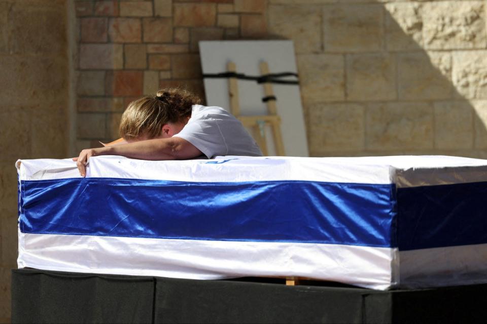 The mother of Israeli soldier Corporal Noa Marciano during her funeral (Reuters)