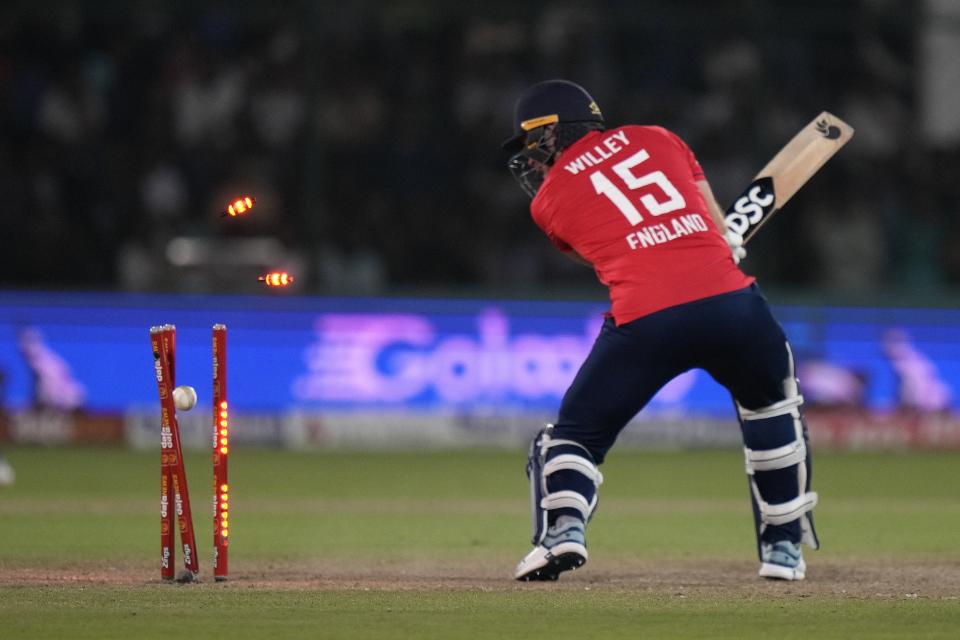 England's David Willey is bowled out by Pakistan's Harif Rauf during the fourth twenty20 cricket match between Pakistan and England, in Karachi, Pakistan, Sunday, Sept. 25, 2022. (AP Photo/Anjum Naveed)