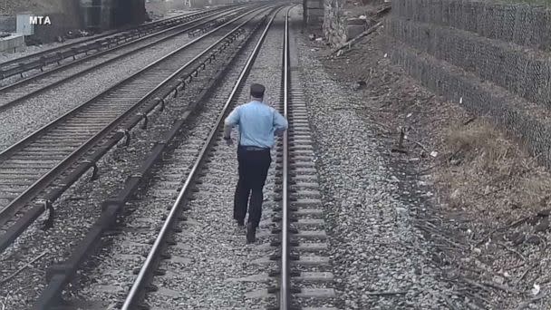 PHOTO: A Metro-North Railroad employee runs down the tracks to rescue a three-year-old boy who wandered onto train tracks in Tarrytown, New York, on April 6, 2023. (Metropolitan Transit Authority)