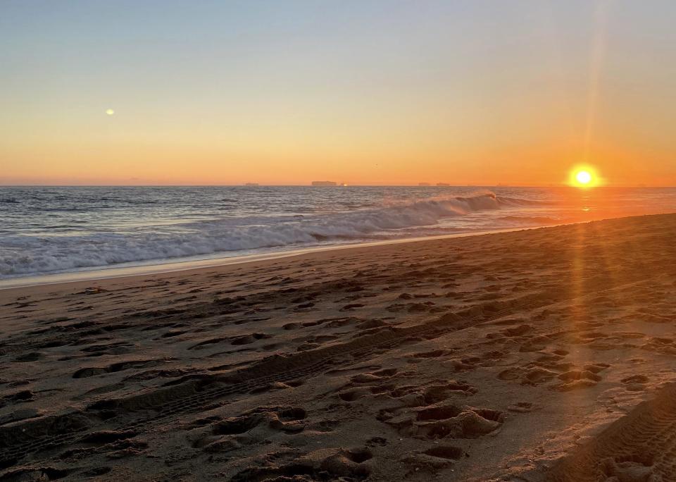 The sun sets over Newport Beach, Calif.