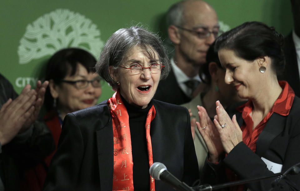 FILE - Oakland, Calif., Mayor Libby Schaaf, right, applauds as newly named Oakland Chief of Police Anne Kirkpatrick, center, is introduced during a news conference, Jan. 4, 2017, in Oakland. New Orleans Mayor LaToya Cantrell said Monday, Sept. 11, 2023, that she has chosen Kirkpatrick, a former chief of police in Spokane, Wash., and Oakland, Calif., to head the New Orleans Police Department, a nomination subject to the approval of the City Council. (AP Photo/Ben Margot, File)