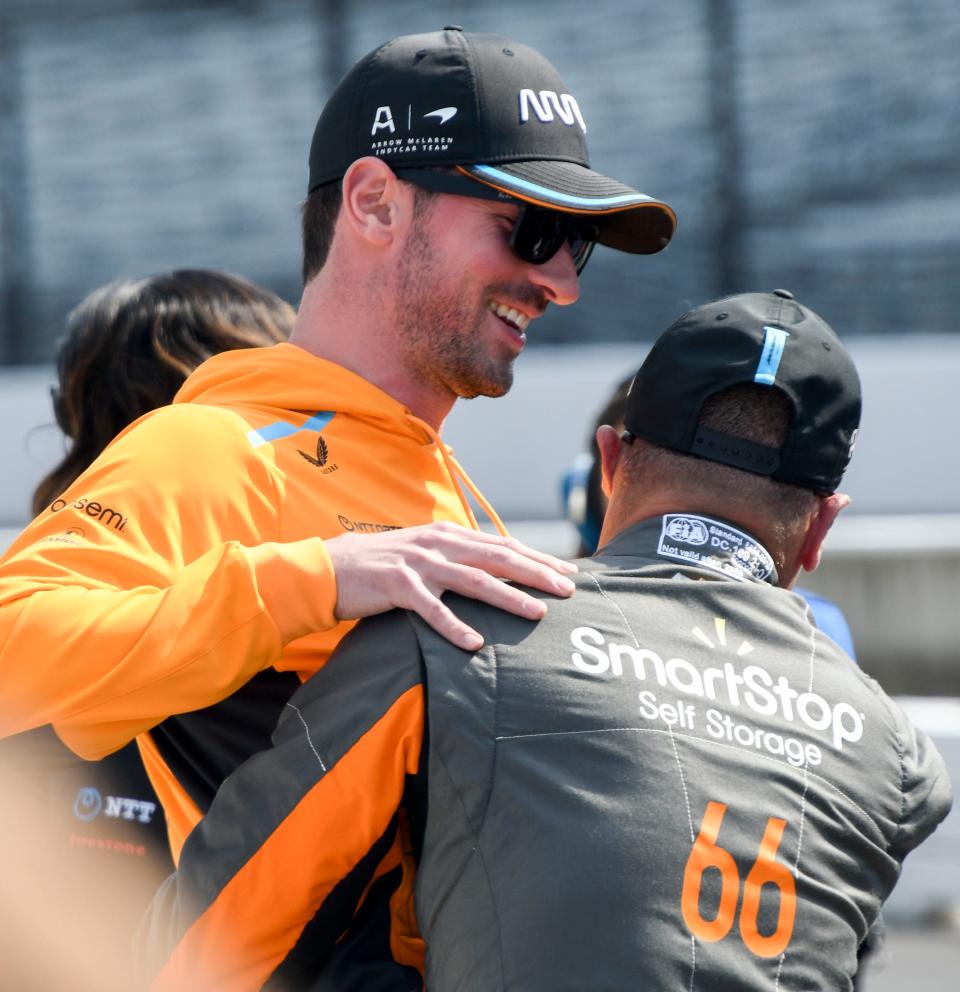 Arrow McLaren SP driver Alexander Rossi (7) celebrates with Arrow McLaren SP driver Tony Kanaan (66) after Kanaan improved his qualifying time Saturday, May 20, 2023, during first day of qualifying ahead of the 107th running of the Indianapolis 500 at Indianapolis Motor Speedway. 