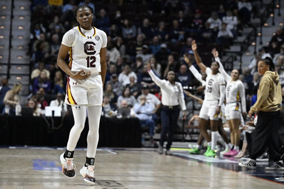 South Carolina guard MiLaysia Fulwiley (12) gestures after making a basket in the first half of an NCAA college basketball game against Utah, Sunday, Dec. 10, 2023, in Uncasville, Conn. | Jessica Hill, Associated Press