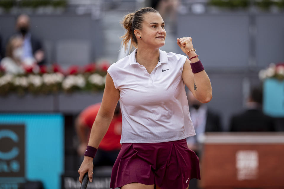 Aryna Sabalenka of Belarus celebrates a point during the women's final match against Australia's Ashleigh Barty at the Mutua Madrid Open tennis tournament in Madrid, Spain, Saturday, May 8, 2021. (AP Photo/Bernat Armangue)