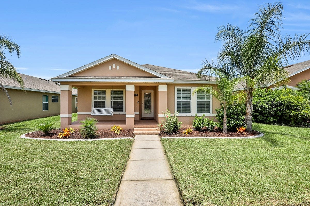 This well-maintained home in the sought-after New Smyrna Beach community of Venetian Bay offers access from two streets – the front door from one street and the two-car garage from the street behind.