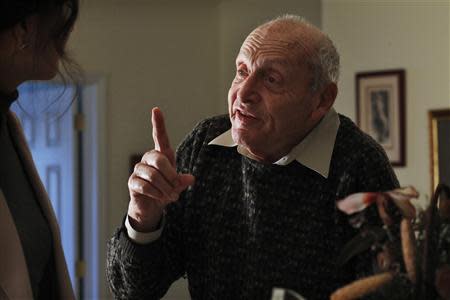 Harry Ettlinger speaks to a journalist during an interview at his home at Rockaway in New Jersey, November 20, 2013. REUTERS/Eduardo Munoz