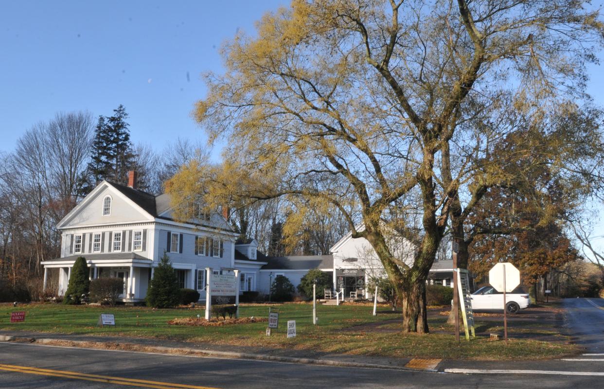 The Village Courtyard project by developers Chuck Deluga and Paul Sullivan of Dennis-based Betterwood Homes proposes to build 20 townhouse-style condominiums for residents 55 and older in the village of Dennis. Fifteen of the units would be built at 744 Main St., shown in the photo.