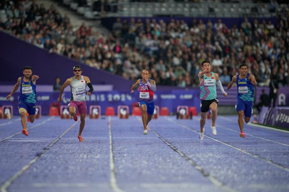 Petrucio Ferreira, left, surges late to clinch gold (AP)