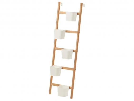 A vertical plant stand will free up floor space which is great if you're limited on room (Ikea)