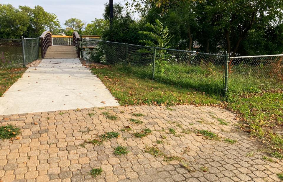 A paver walkway in Wilmington's Christina Park, seen Wednesday, Aug. 30, 2023. A city assessment studying compliance with the Americans with Disabilities Act notes the paved brick walkway's uneven slope among other areas in need of improvement in the park.