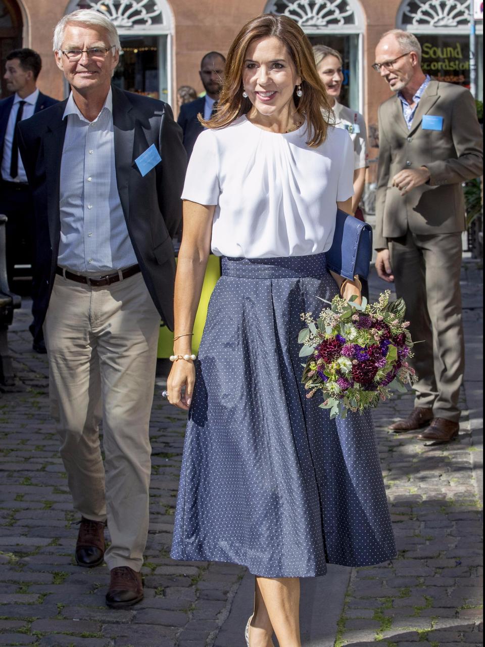 Princess Mary glows in chic ensemble