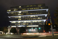 FILE - In this Sept. 12, 2019, file photo, cars pass Purdue Pharma headquarters in Stamford, Conn. The company, which makes OxyContin and other drugs, filed court papers in New York on Sunday, Sept. 15 seeking Chapter 11 bankruptcy protection. (AP Photo/Frank Franklin II, File)