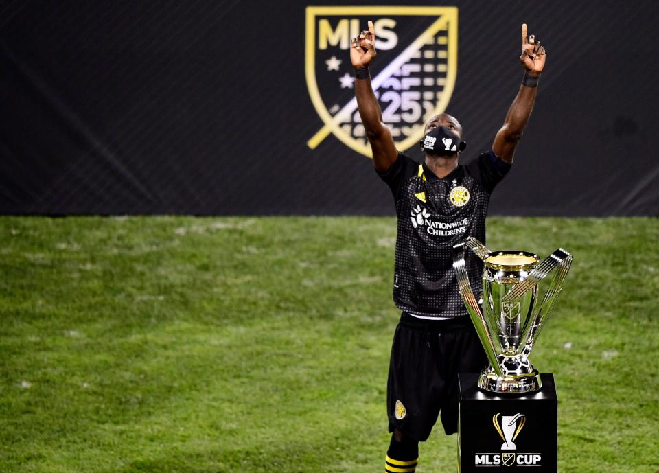 COLUMBUS, OHIO - DECEMBER 12: Jonathan Mensah #4 of Columbus Crew celebrates with the MLS Cup after a 3-0 win over the Seattle Sounders during the MLS Cup Final at MAPFRE Stadium on December 12, 2020 in Columbus, Ohio. (Photo by Emilee Chinn/Getty Images)
