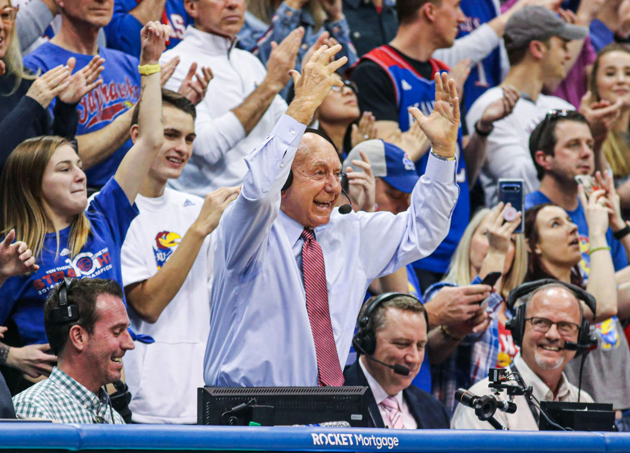 Feb 1, 2020; Lawrence, Kansas, USA; ESPN broadcaster Dick Vitale interacts with the crowd during the second half of the game between the Texas Tech Red Raiders and the Kansas Jayhawks at Allen Fieldhouse. Mandatory Credit: Jay Biggerstaff-USA TODAY Sports