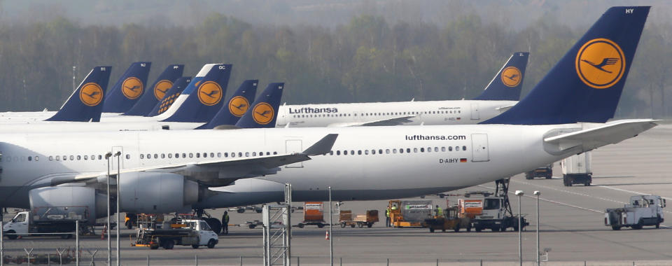 Lufthansa planes are parked at the airport in Munich, southern Germany, Tuesday, April 1, 2014. Germany's biggest airline Lufthansa will cancel some 3,800 flights because of a three-day strike by the pilots' union later this week, hitting more than 425,000 passengers. The cancellations include domestic and intercontinental connections Wednesday, Thursday and Friday. (AP Photo/Matthias Schrader)