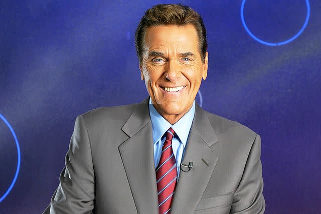 <p>Carlo Allegri/Getty</p> Chuck Woolery in 2003