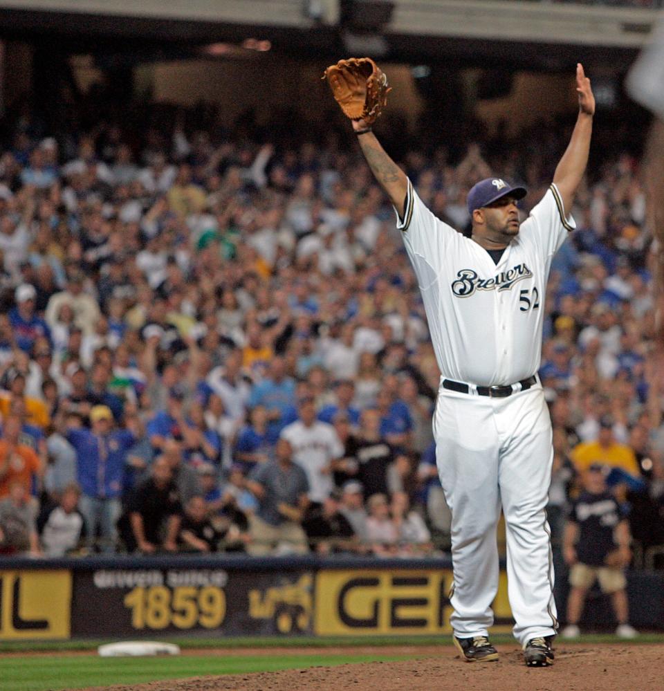 Milwaukee Brewers' CC Sabathia celebrates after beating the Chicago Cubs at Miller Park on Sept. 28, 2008.