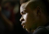 University of Massachusetts basketball guard Derrick Gordon, 22, faces reporters on the school's campus, Wednesday, April 9, 2014, in Amherst, Mass. Gordon has become the first openly gay player in Division I men's basketball. (AP Photo/Steven Senne)