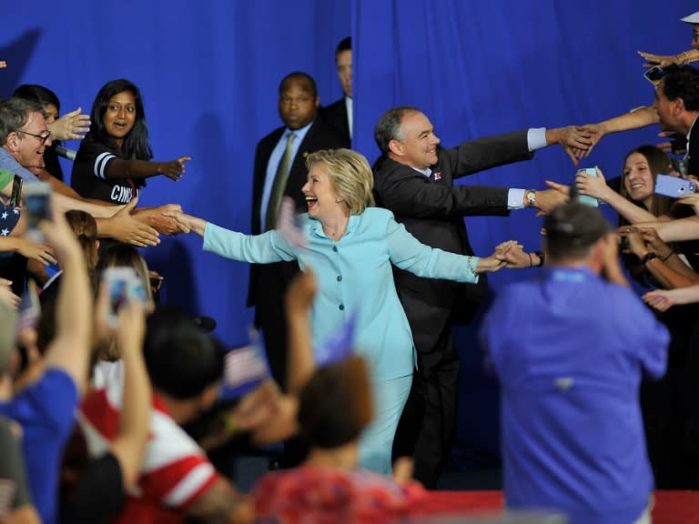 US Democratic presidential candidate Hillary Clinton and her running mate Senator Tim Kaine, arrive for a campaign rally at Florida International University in Miami