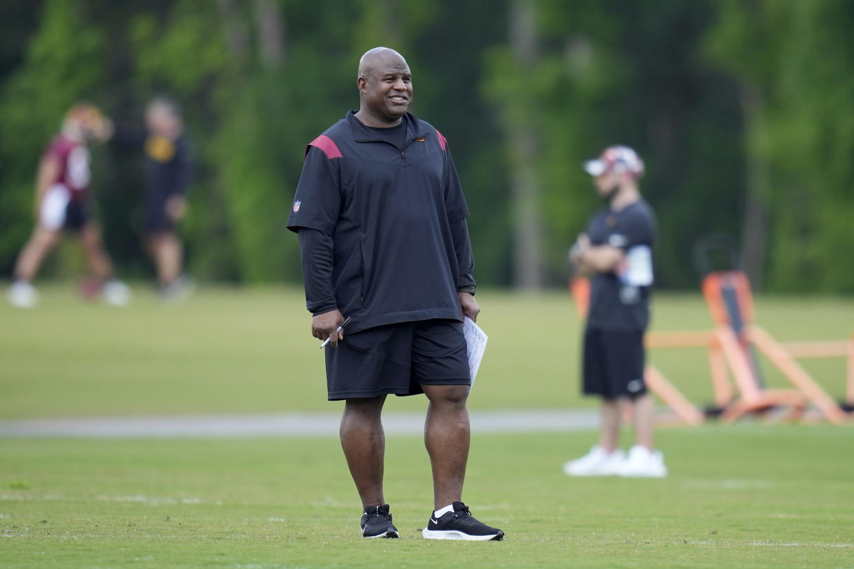 Washington Commanders assistant head coach/offensive coordinator Eric Bieniemy watches the NFL football team's rookie minicamp, Friday, May 12, 2023, in Ashburn, Va. (AP Photo/Patrick Semansky)