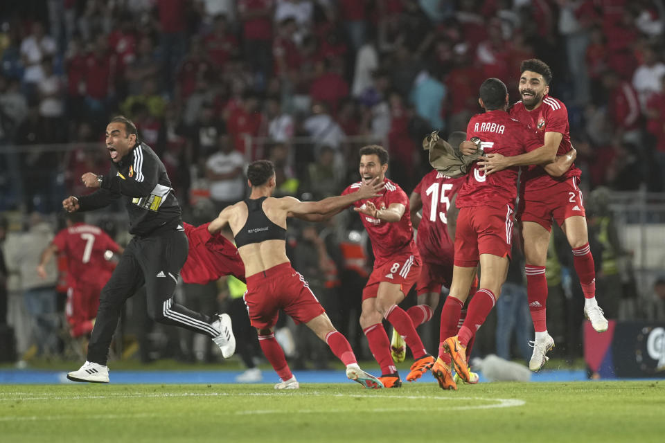 Al Ahly players celebrate after winning the CAF Champions League final soccer match between Morocco's Wydad Athletic Club and Egypt's Al Ahly SC, at the Mohammed V stadium, in Casablanca, Morocco, Sunday, June 11, 2023. (AP Photo/Mosa'ab Elshamy)