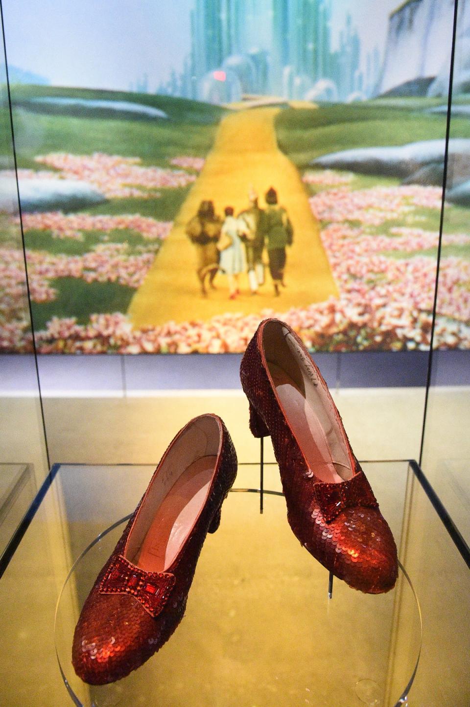 A pair of ruby slippers worn by Judy Garland in the Wizard of Oz on display at the Academy Museum in 2021 (Richard Shotwell/Invision/AP)