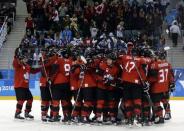 Ice Hockey - Pyeongchang 2018 Winter Olympics - Man’s Quarterfinal Match - Canada v Finland - Gangneung Hockey Centre, Gangneung, South Korea - February 21, 2018 - Team Canada celebrates victory. REUTERS/David W Cerny