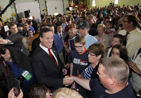 Republican presidential candidate and former U.S. Senator Rick Santorum greets supporters after formally declaring his candidacy for the 2016 Republican presidential nomination during an event in Cabot, Pennsylvania, May 27, 2015. REUTERS/Aaron Josefczyk